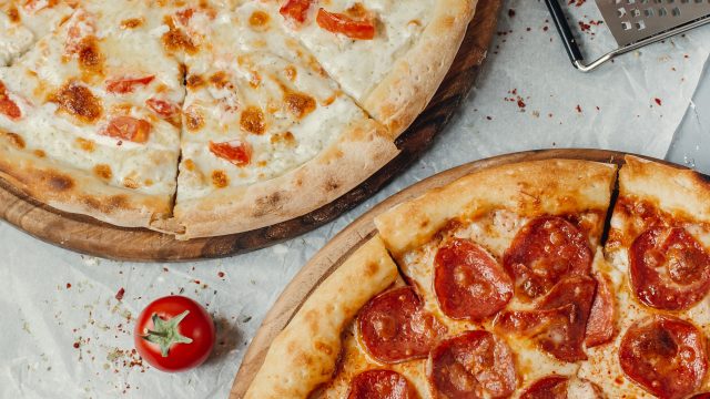 two kind of pizza on the table